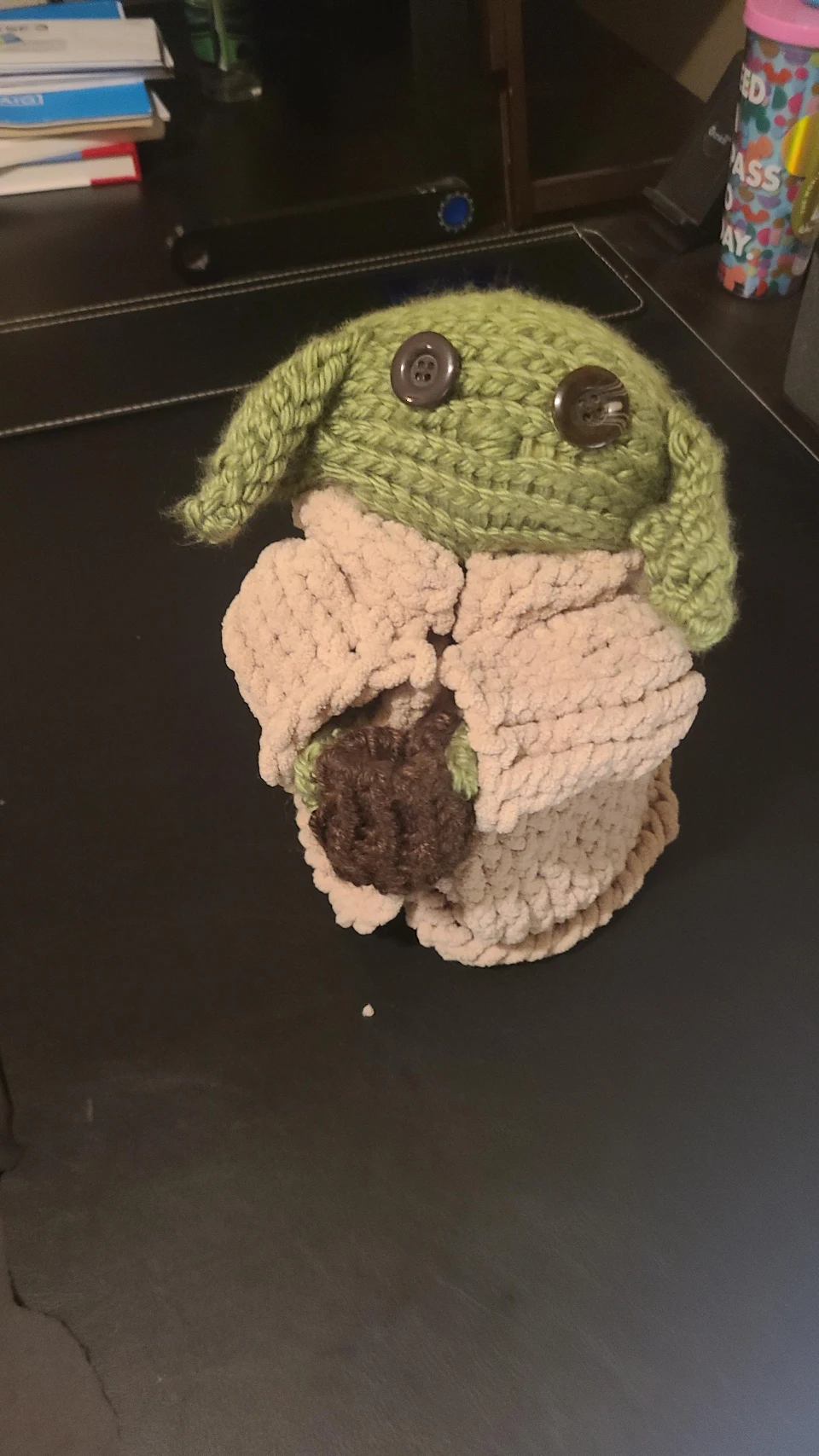 A coworker knitted my mom a yarn grogu