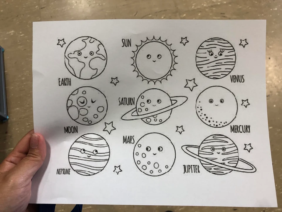 A preschool solar system coloring page with a missing planet