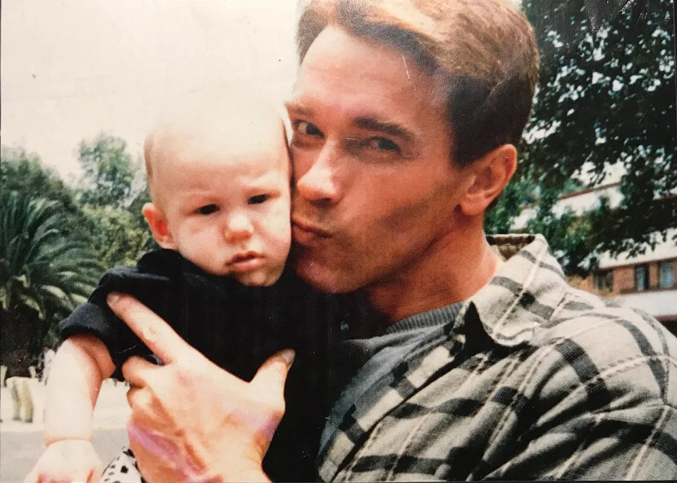 Here’s Arnold Schwarzenegger kissing me as a baby. I post it every year for his birthday!