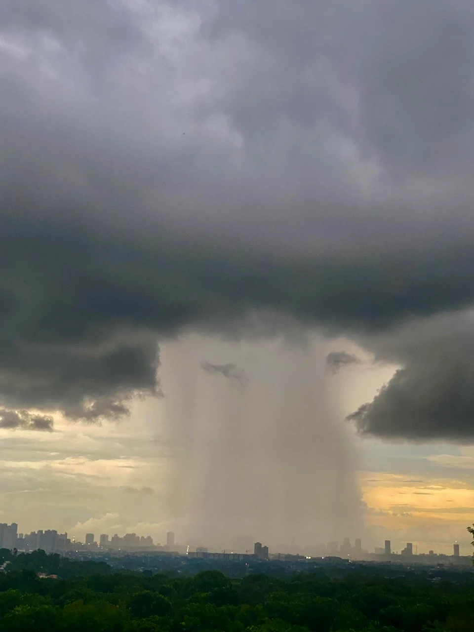 Isolated rain storm this week over Manila Philippines.