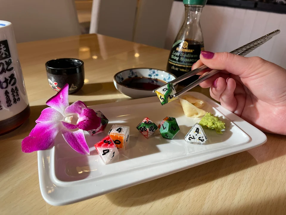I bought sushi dice! (…and then took them to sushi to take this photo)