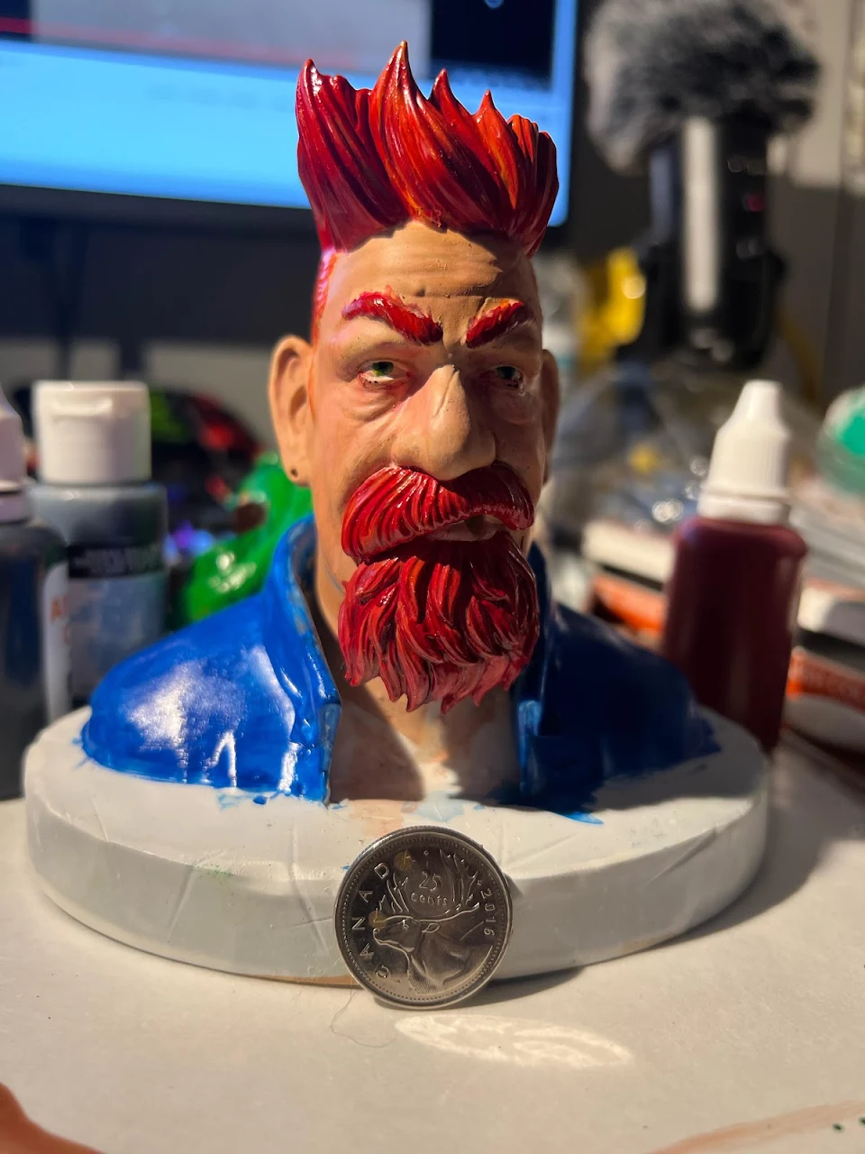 my first attempt (wip) at painting a small bust. CDN quarter for scale.