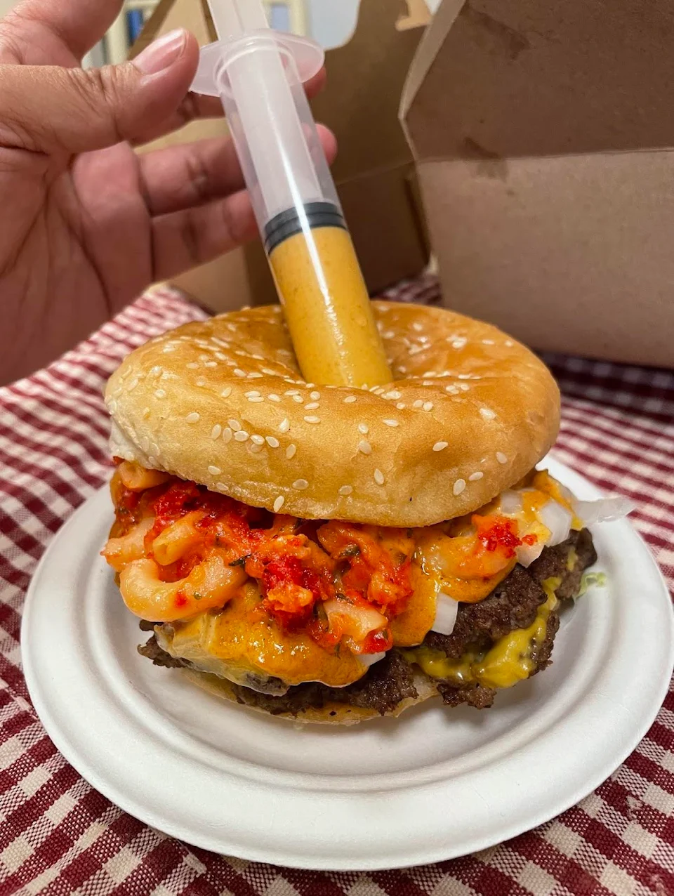 Tried a new food place and ordered their “Junkie” burger. It came with a special sauce syringe.
