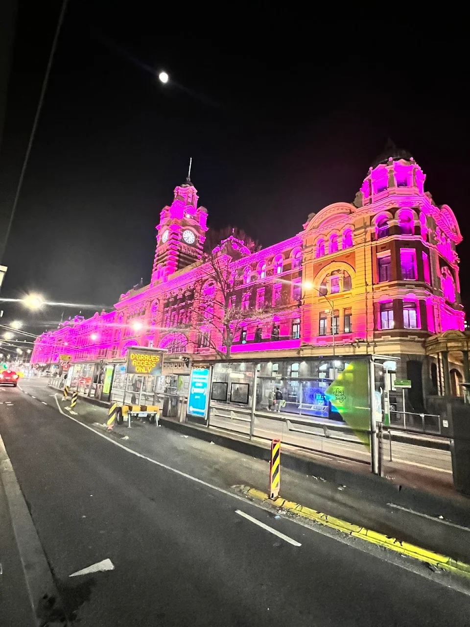 Flinders St Station, Melbourne Australia lit up pink tonight in honour of Olivia Newton John. RIP