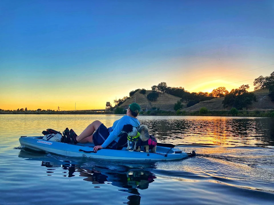 sneaking in a paddle after work with the doggos