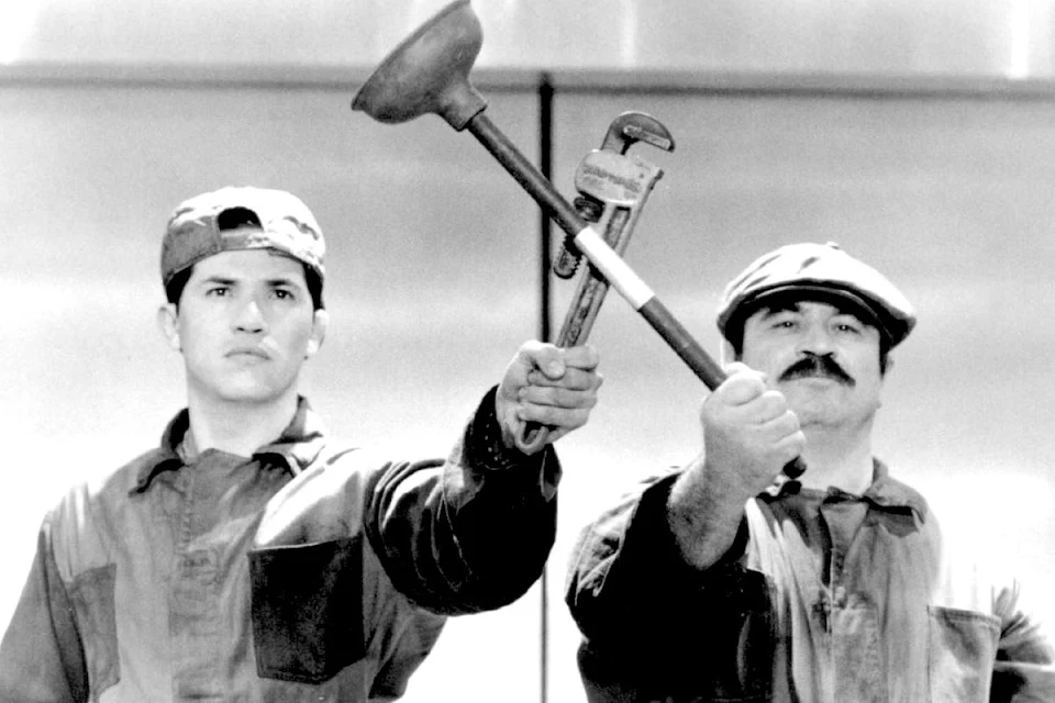 Bob Hoskins and John Leguizamo on the set of “Super Mario Bros” (1993)